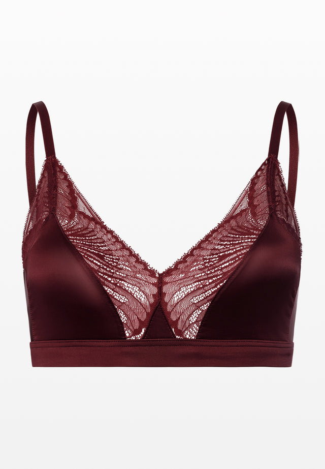 Burgundy bra with lace detailing on a white background
