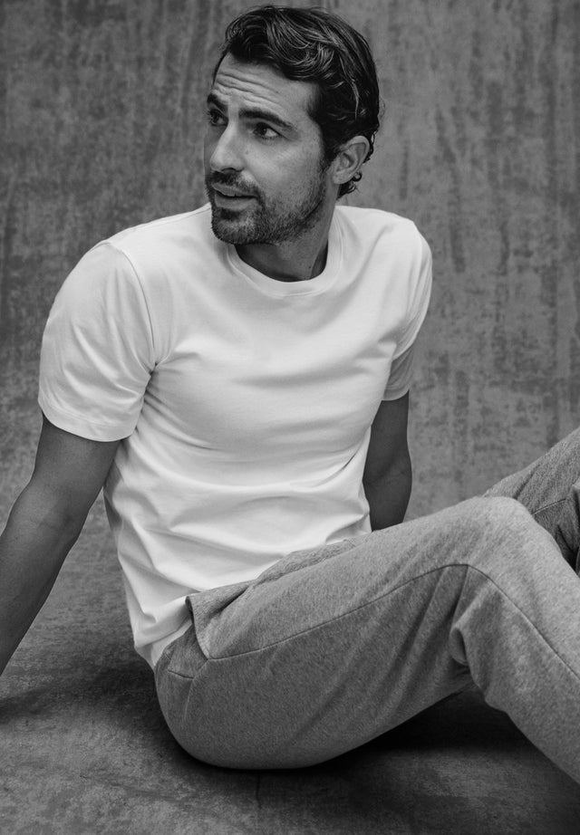 Man posing in White Cotton T shirt and Grey Mélange Sweatpants
