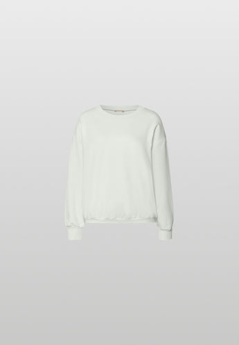 light green pullover on light grey background