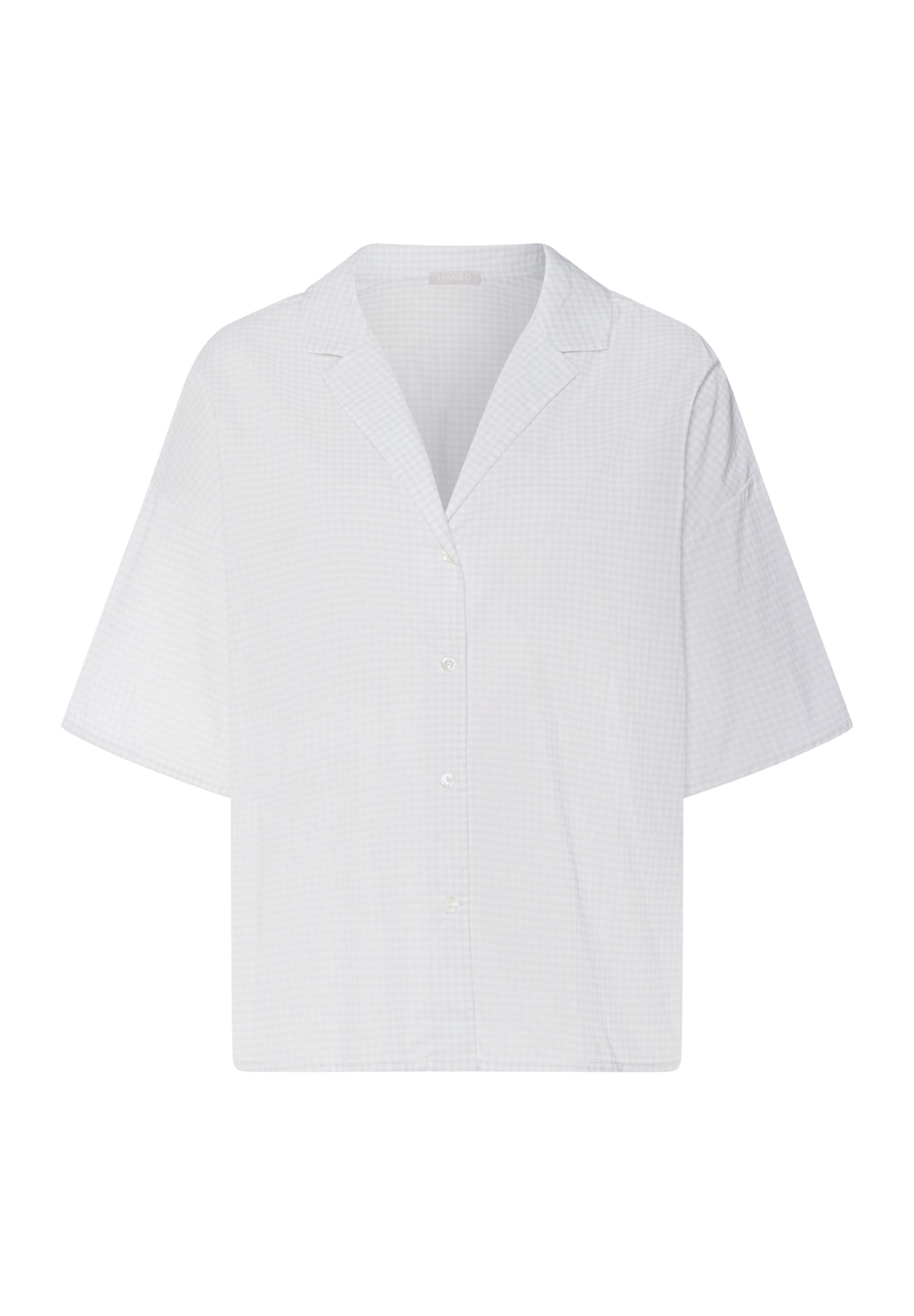 White blouse with a V-neck on a white background
