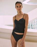 Woman wearing best-selling Allure Camisole in Obsidian.