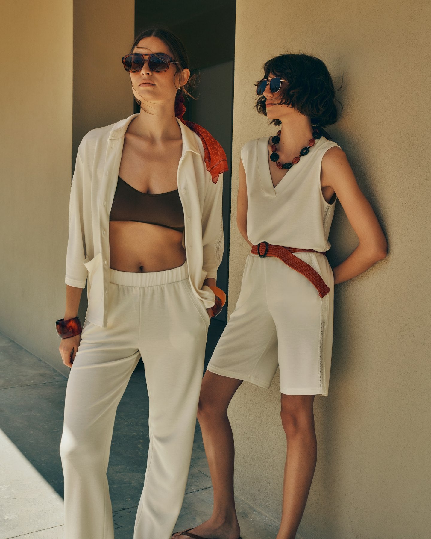 Two women wearing the Pure Comfort collection in Misty White, paired with a Touch Feeling Crop Top.