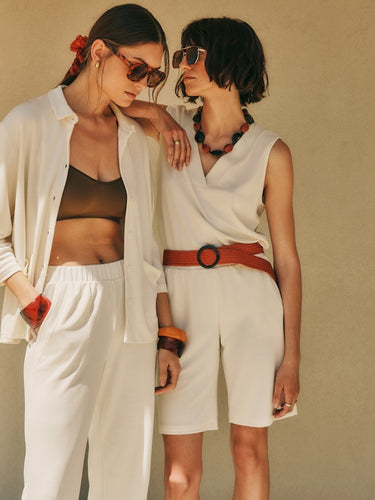 Women posing together wearing the Pure Comfort collection in Misty White
