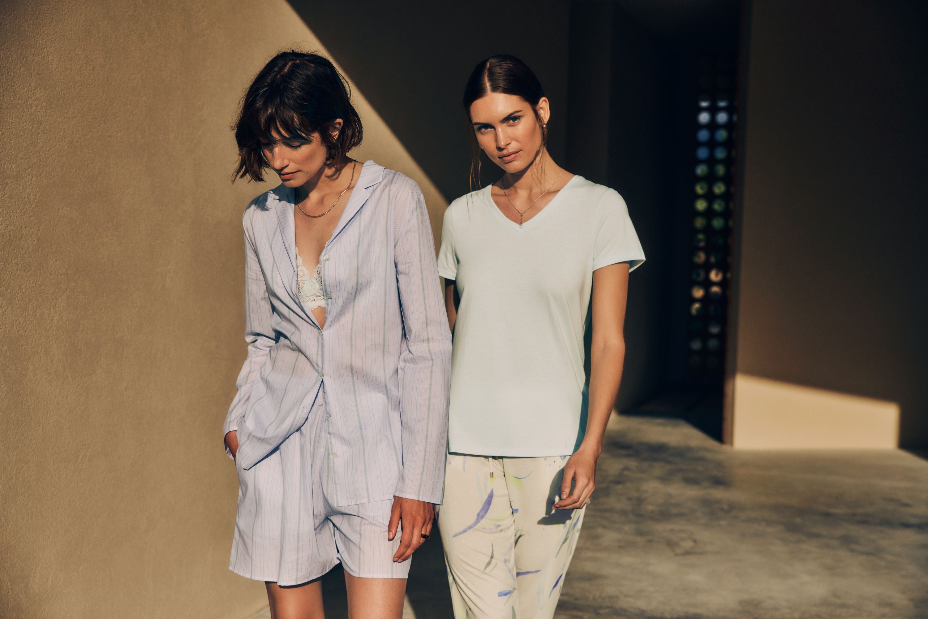2 women wearing pajamas from Sleep & Lounge Collection