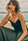 Women on beach wearing Style Icon Cotton Seamless V-Neck Cotton Camisole in Deep Navy