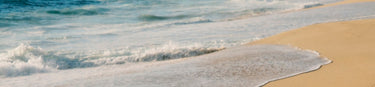 Waves breaking on the shore